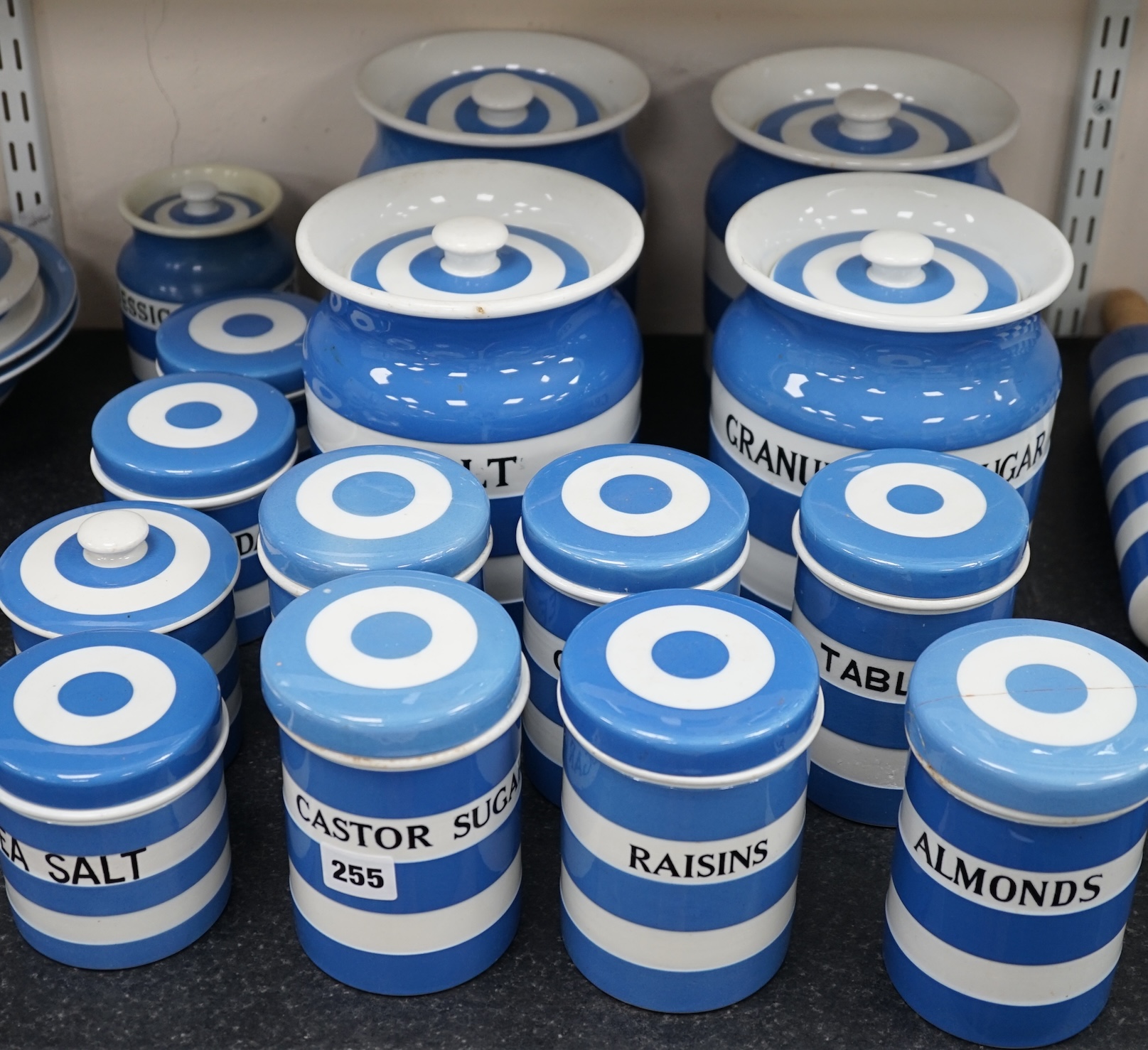 T.G.Green Cornish Kitchenware, fifteen lidded storage jars to include Meal, Granulated Sugar, Dessicated-Coconut and Sea Salt, largest 20cm high, mainly Black Shield marks. Condition - poor, fair and good